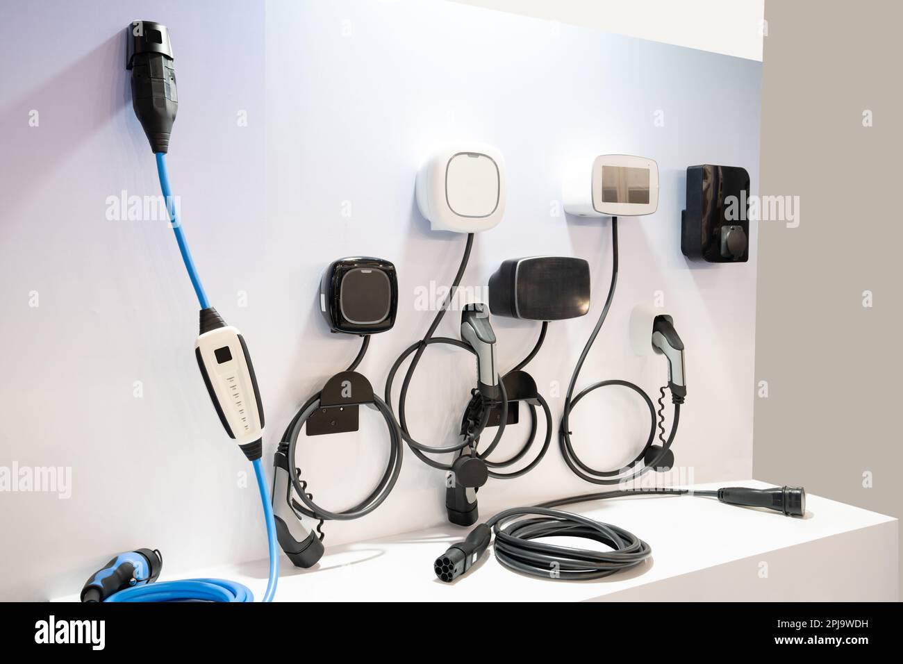 A lot of charging stations for electric vehicles on a wall. High quality photo Stock Photo