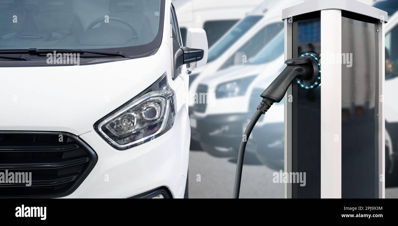 Electric delivery van with electric vehicles charging station. High quality photo Stock Photo