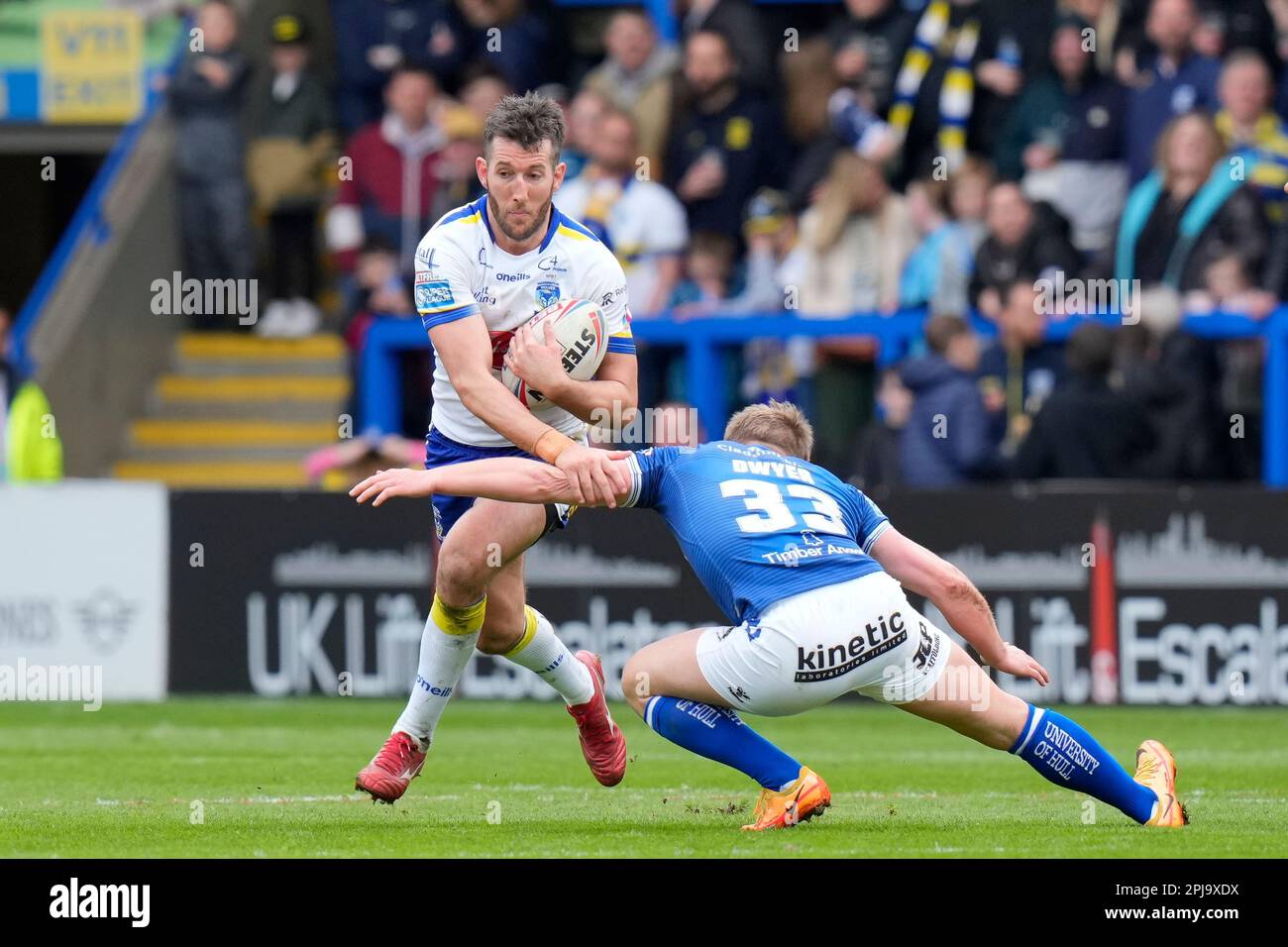 Warrington Uk 01st Apr 2023 Brad Dwyer 33 Of Hull Fc Tackles Stefan Ratchford 4 Of