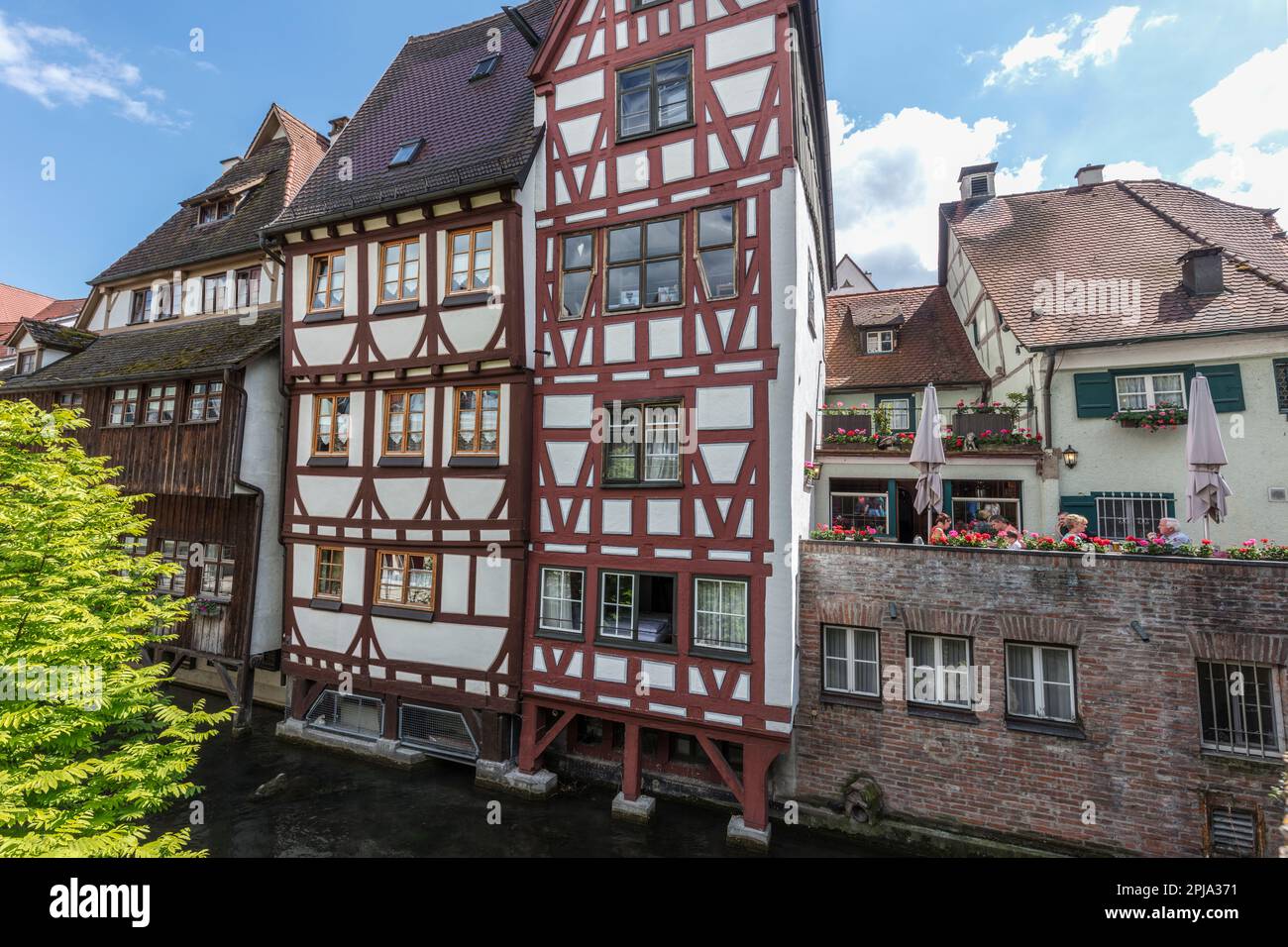Half timbered (r-i) Haus der Forelle, Schmales Haus, Wohn Haus Fishermen's and Danube quarter - Fischer-Donauviertel by Blau river, Old Town, Ulm. Stock Photo