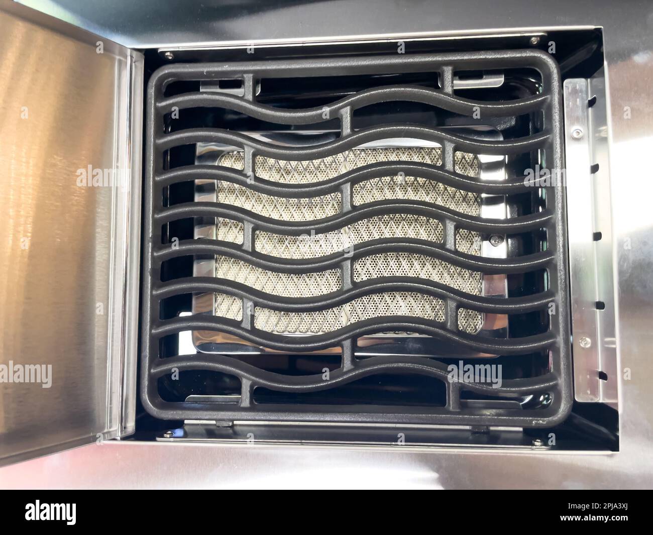 Stainless steel gas grill grates. Modern gas grill. Closeup Stock