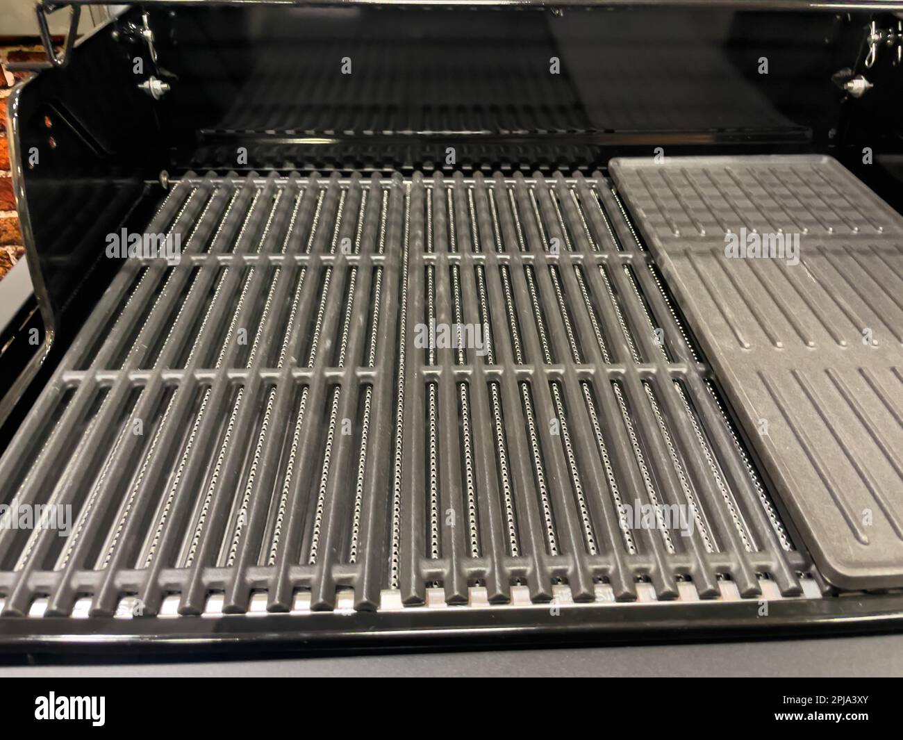 Stainless steel gas grill grates. Modern gas grill. Closeup Stock