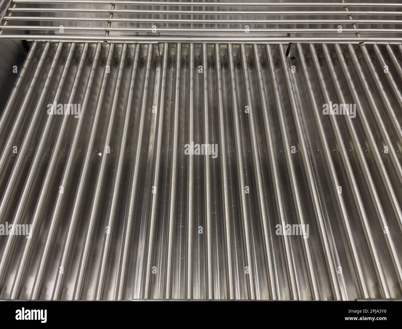 Stainless steel gas grill grates. Modern gas grill. Closeup Stock