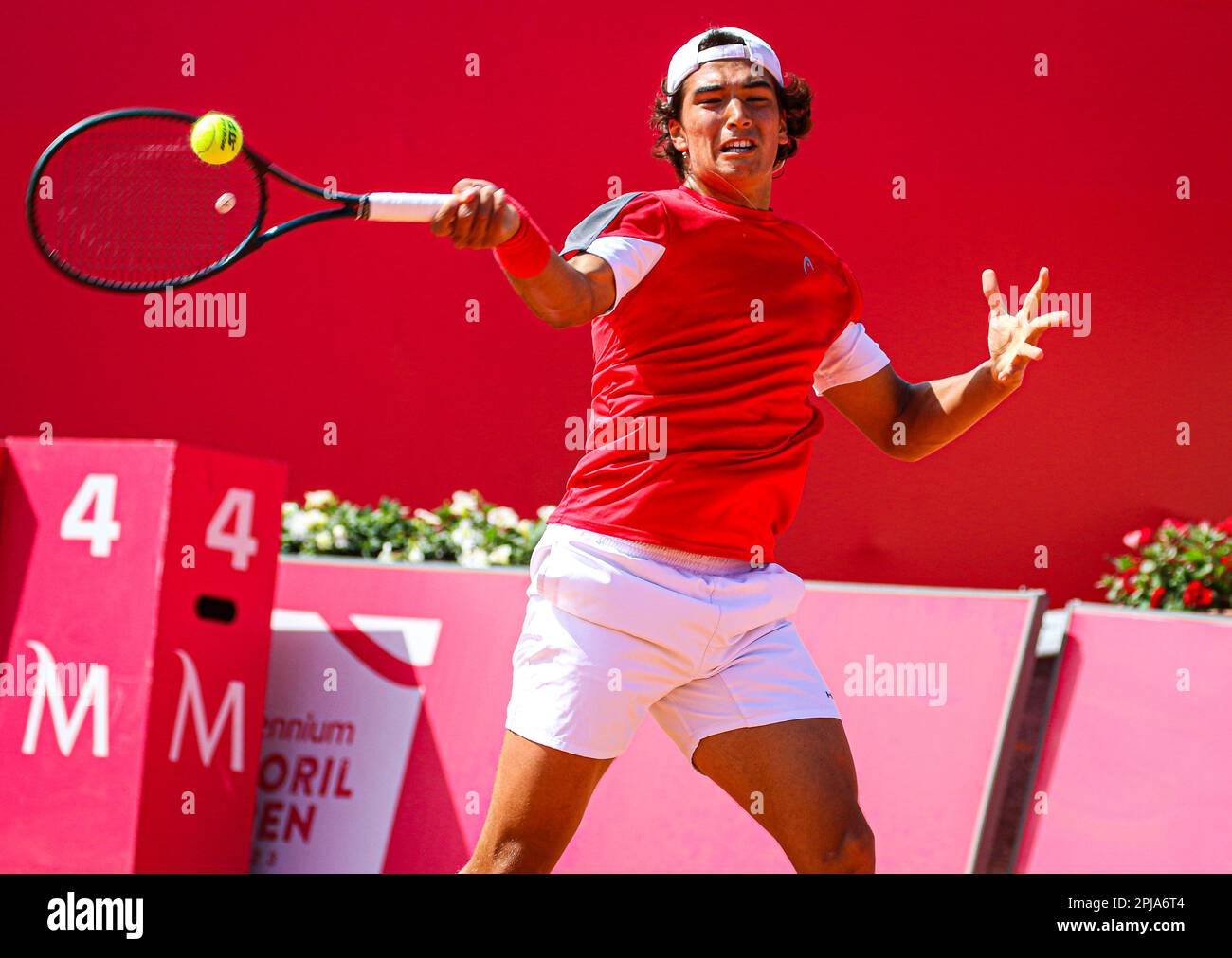 Estoril, Portugal. 01st Apr, 2023. Henrique Rocha of Portugal plays against Ryan Peniston of Great Britain, during the qualifying of the Millennium Estoril Open tournament at CTE- Clube de Ténis do Estoril . (Photo by Miguel Reis/SOPA Images/Sipa USA) Credit: Sipa USA/Alamy Live News Stock Photo