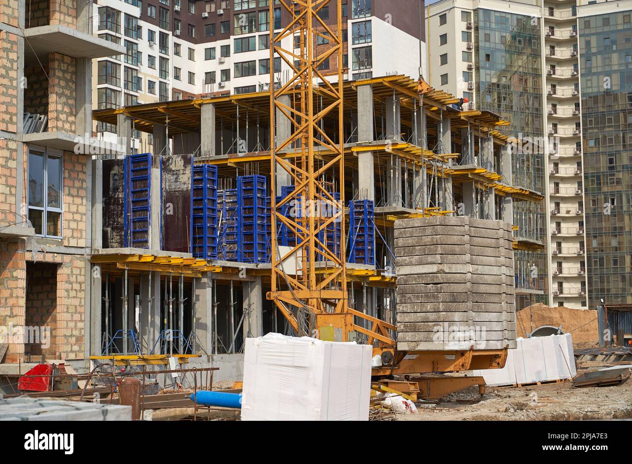 Construction site. High rise Building under construction. Construction of high-rise residential building Stock Photo