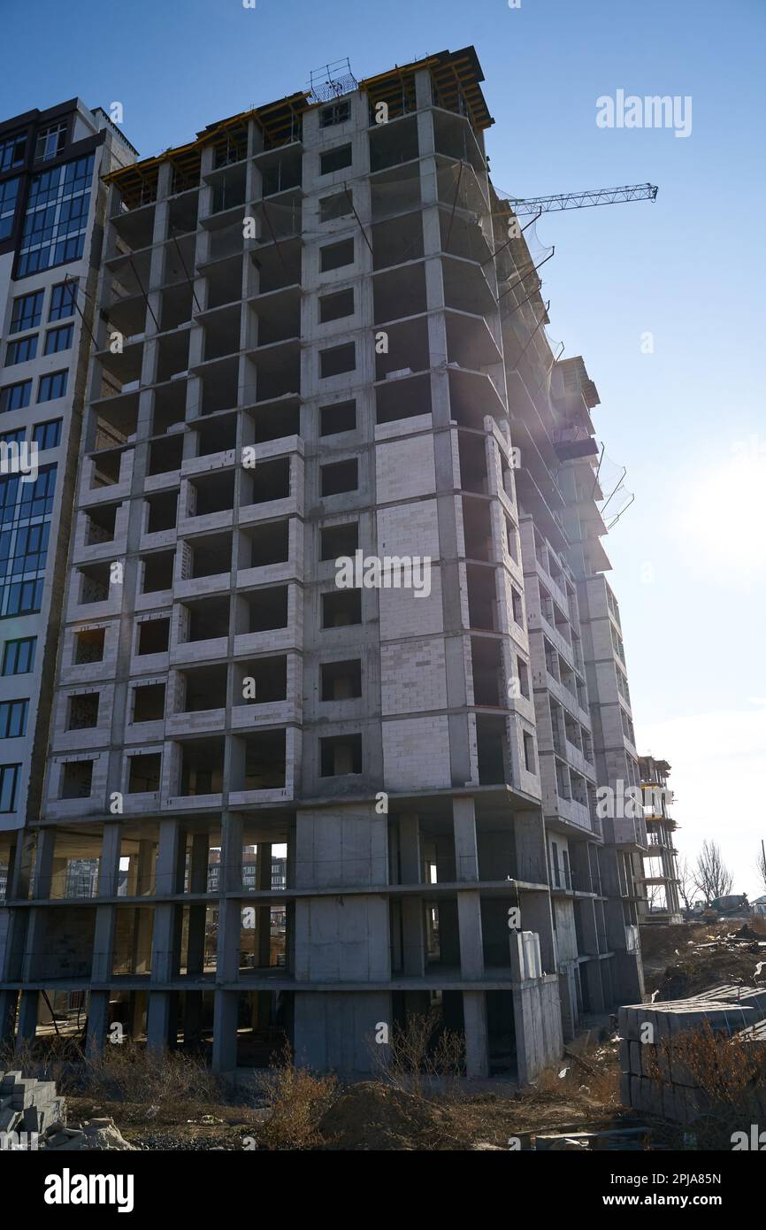 Construction site. High rise Building under construction. Construction ...