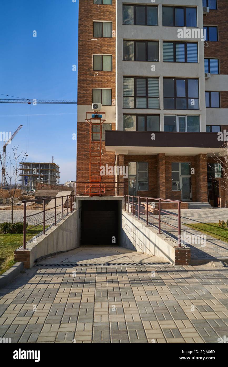 The entrance to the underground parking of the apartment building. Stock Photo