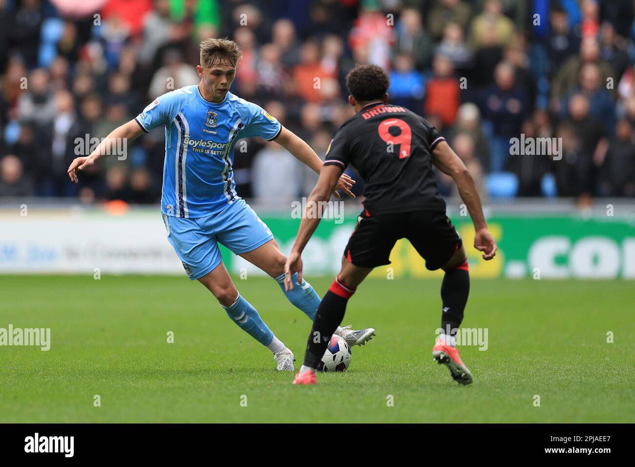 Coventry City's Callum Doyle (left) and Stoke City's Jacob Brown battle for the ball during the Sky Bet Championship match at the Coventry Building Society Arena, Coventry. Picture date: Saturday April 1, 2023. Stock Photo