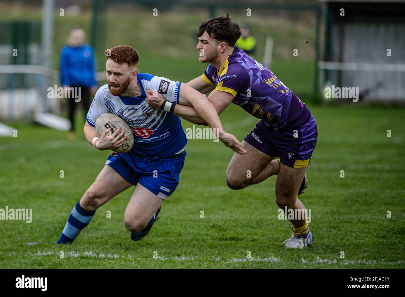 Rochdale Mayfield's James McDaid is tackled Newcastle Thunder's Marcus Walker during the Betfred Challenge Cup Fourth Round match between Rochdale Mayfield ARLFC and Newcastle Thunder at Keswick Street, Rochdale on Saturday 1st April 2023. (Photo: Ian Charles | MI News) Stock Photo