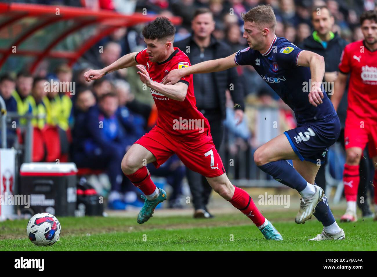 Leyton Orient's Paul Smyth (left) and Carlisle United's Jack Armer battle for the ball during the Sky Bet League Two match at Brisbane Road, London. Picture date: Saturday April 1, 2023. Stock Photo