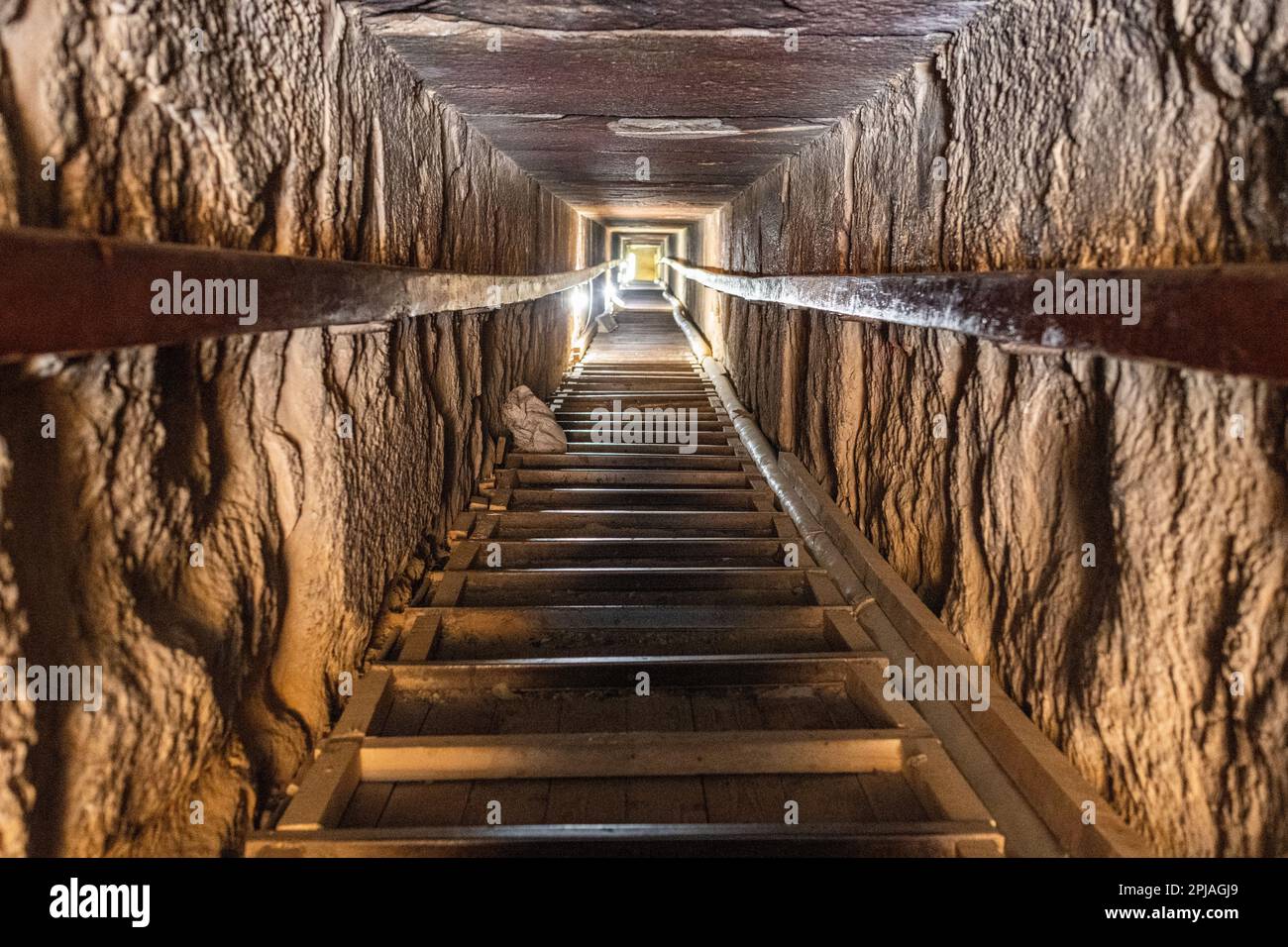 Looking up the tunnel of stairs from inside the Red Pyramid towards its