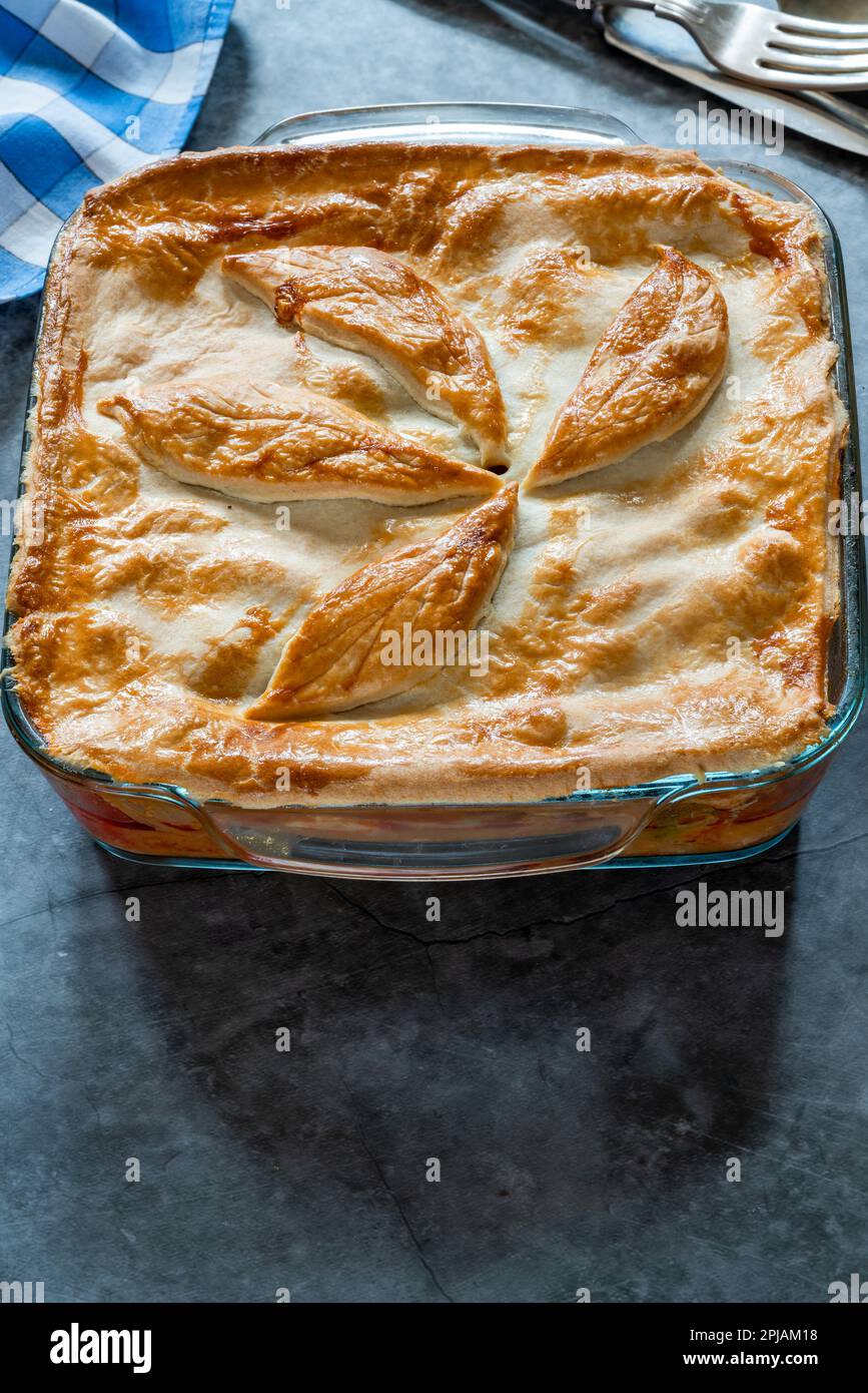 Basque chicken and chorizo pie Stock Photo - Alamy