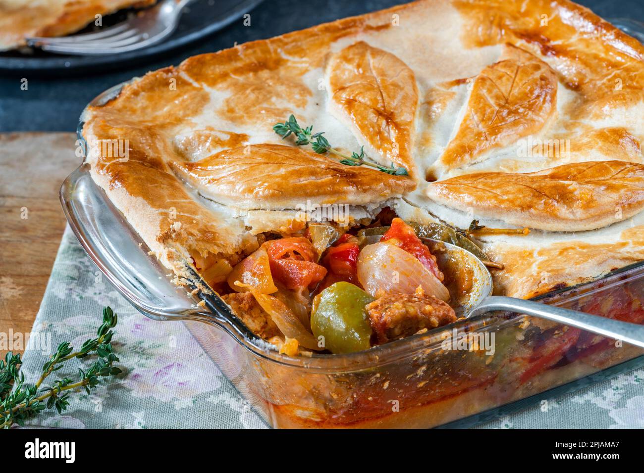 Basque chicken and chorizo pie Stock Photo - Alamy
