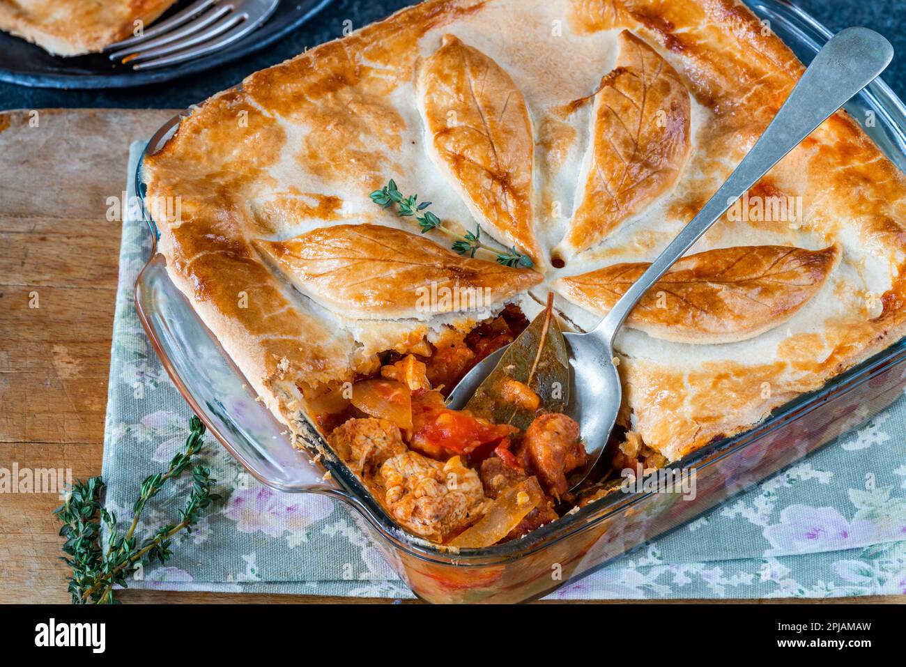 Basque chicken and chorizo pie Stock Photo - Alamy