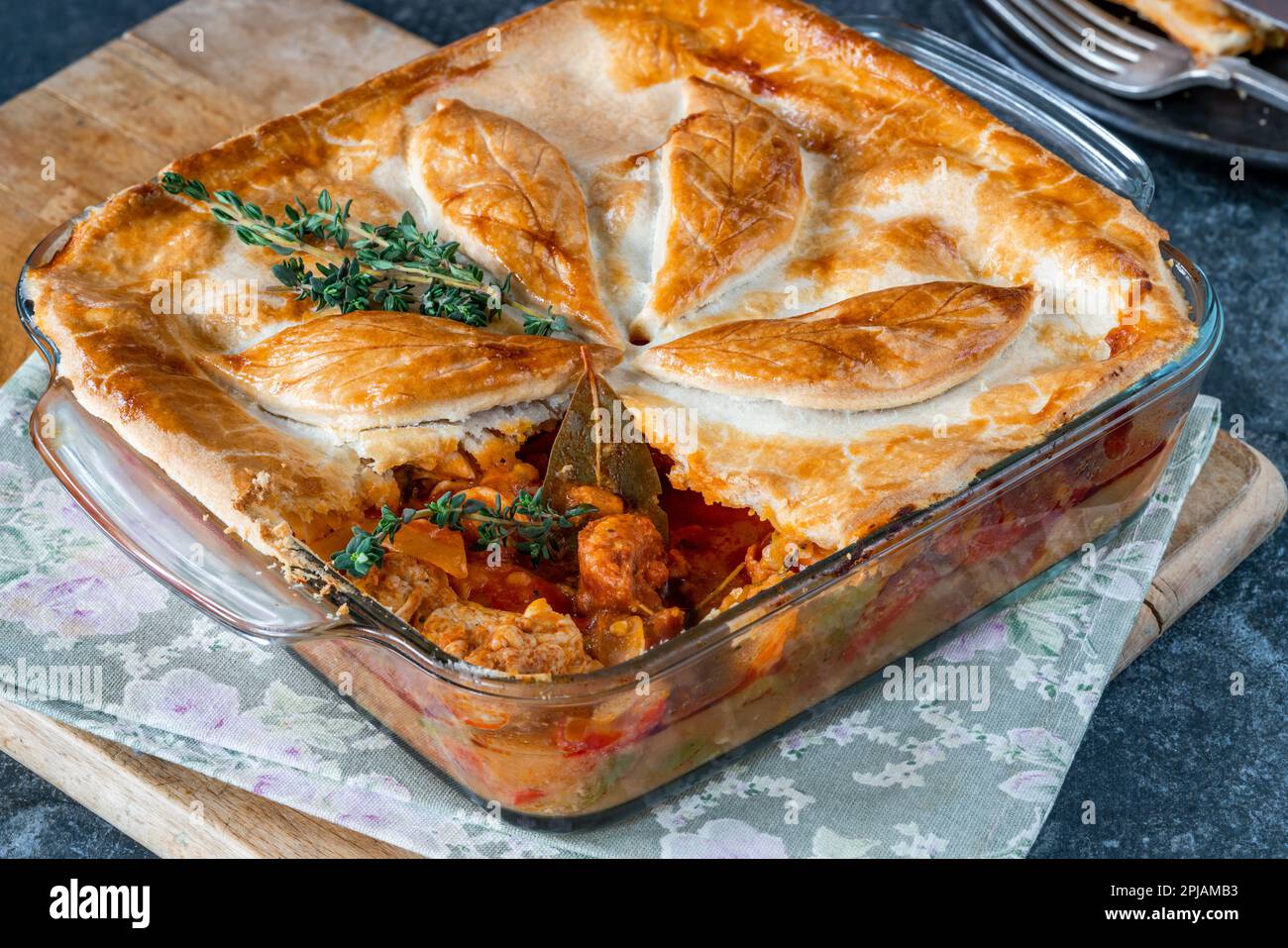 Basque chicken and chorizo pie Stock Photo - Alamy