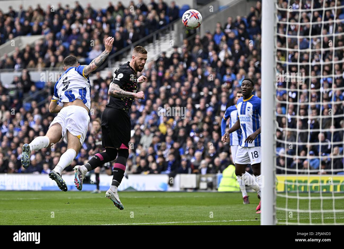 Brighton East Sussex, UK. 1st Apr, 2023. GOAL. Pontus Jansson (Brentford) gets in front of Lewis Dunk (Brighton) to score the first Brentford goal during the Brighton V Brentford Premier League match at the Amex Stadium, Brighton. Credit: MARTIN DALTON/Alamy Live News Stock Photo