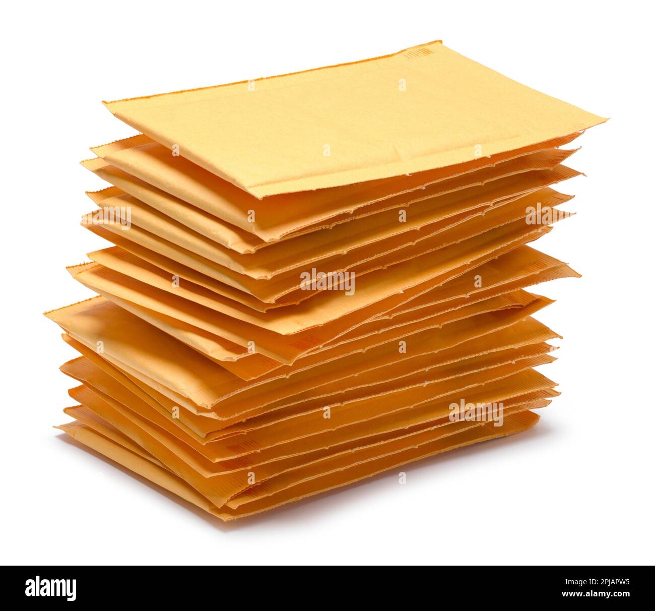 Pile of Yellow Padded Envvelopes Cut Out on White. Stock Photo