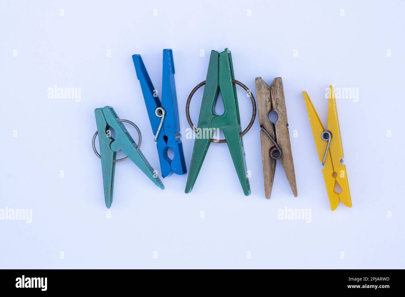 several different countries clothespins on an isolated background Stock Photo