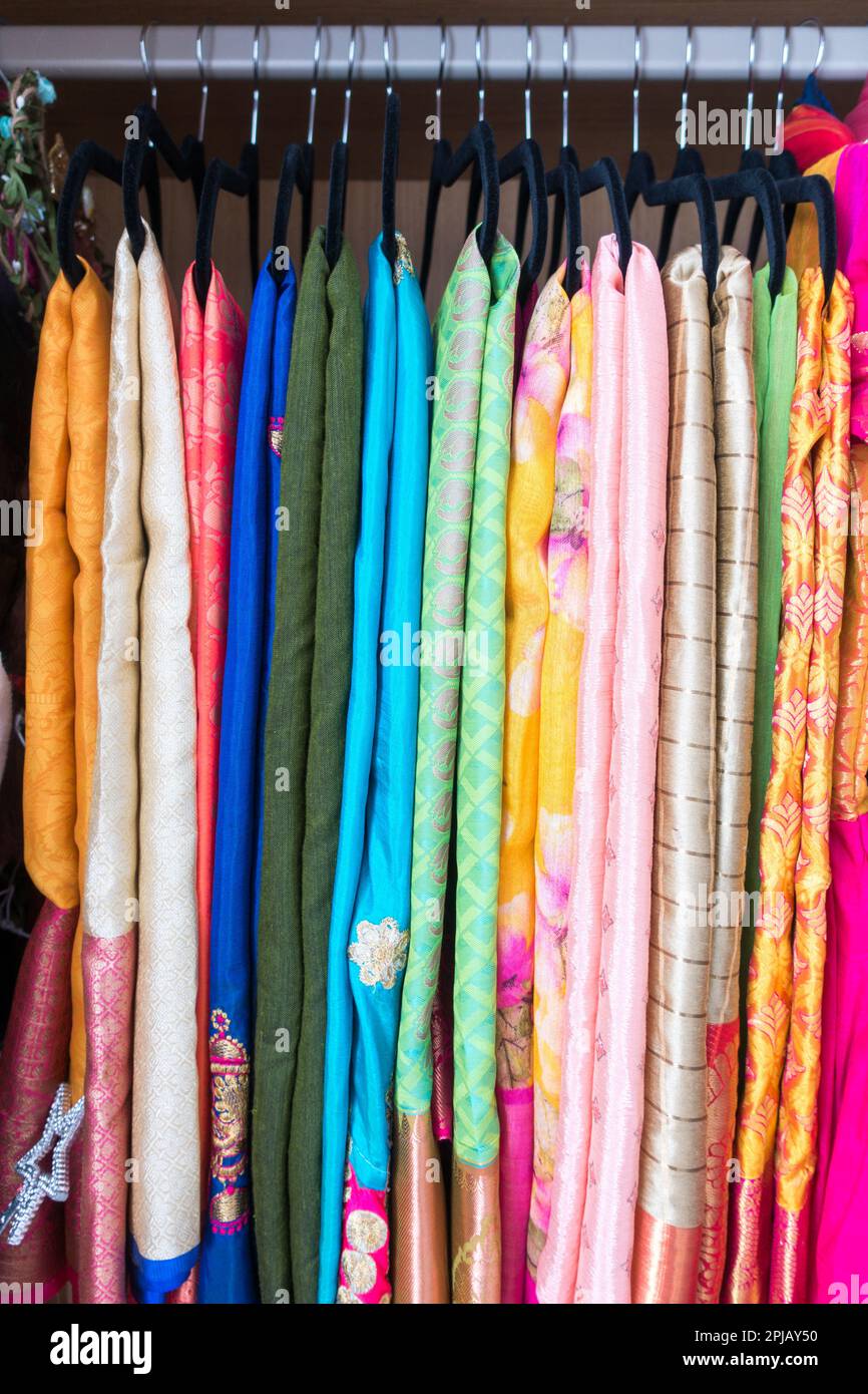 Colorful vibrant Indian Sarees in wardrobe Stock Photo Alamy