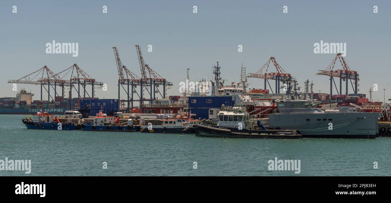 Cape Town, South Africa. 2023. Cape Town port  with many ships and a background of the container port area, Stock Photo