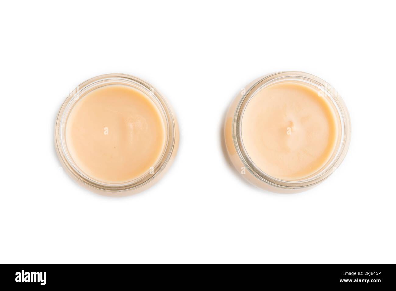 Baby puree with fruits mix, apple, banana infant formula in glass jar