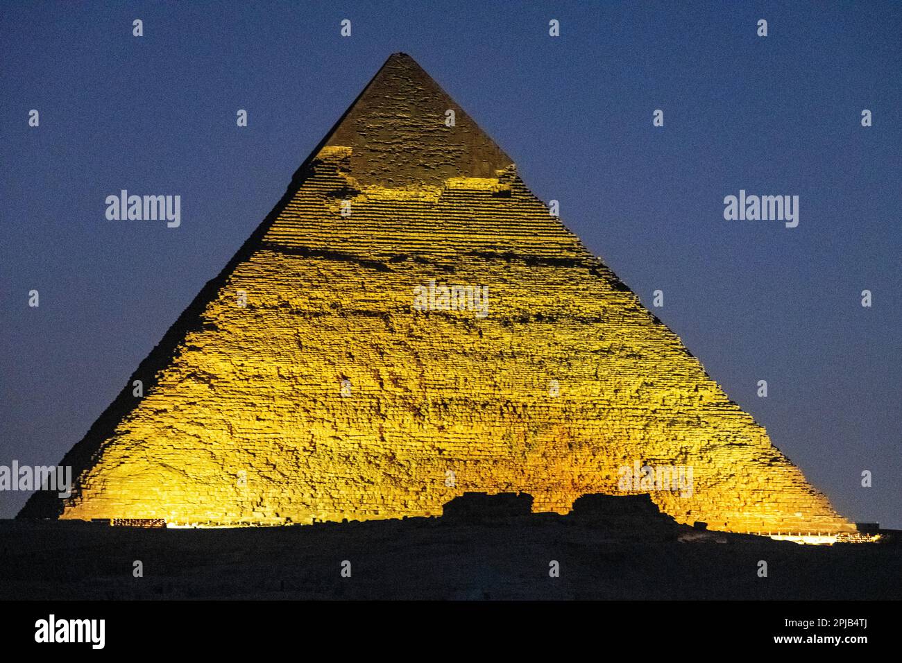 The Pyramids of Giza lit up with lights for the light and sound show at