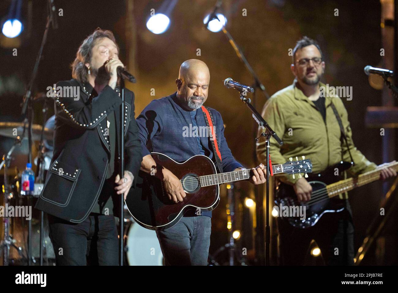 Austin Texas USA, March 31 2023: Chris Robinson of the Black Crowes and country star Darius Rucker perform together during a taping of Country Music Television's long-running Crossroads show at an outdoor stage in downtown. The show brings together a country artist with artists from another musical genre. ©Bob Daemmrich Stock Photo