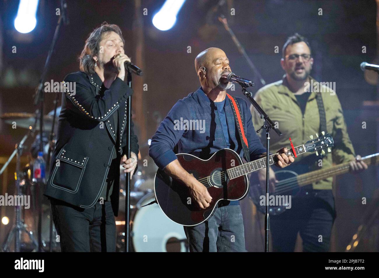 Austin Texas USA, March 31 2023: Chris Robinson of the Black Crowes and country star Darius Rucker perform together during a taping of Country Music Television's long-running Crossroads show at an outdoor stage in downtown. The show brings together a country artist with artists from another musical genre. ©Bob Daemmrich Stock Photo