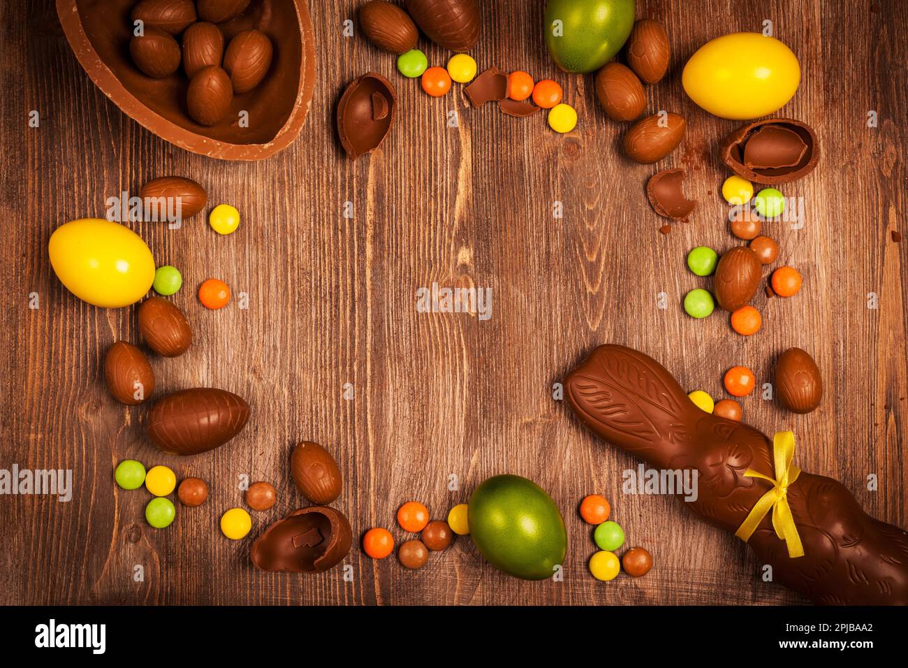 Easter chocolate background with bunny Stock Photo - Alamy