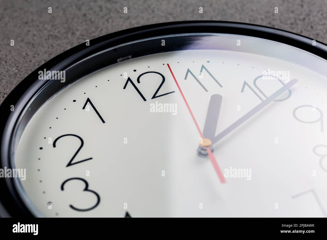 Turn back time concept of turning clock backwards Stock Photo Alamy