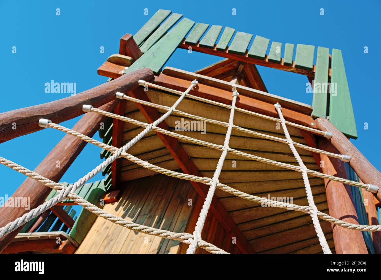 Children's playground with wooden climbing tower Stock Photo Alamy