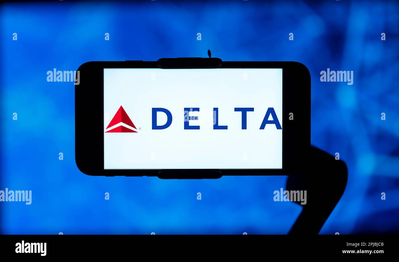 In this photo illustration, the Delta Air lines logo is seen displayed on a mobile phone screen. Stock Photo