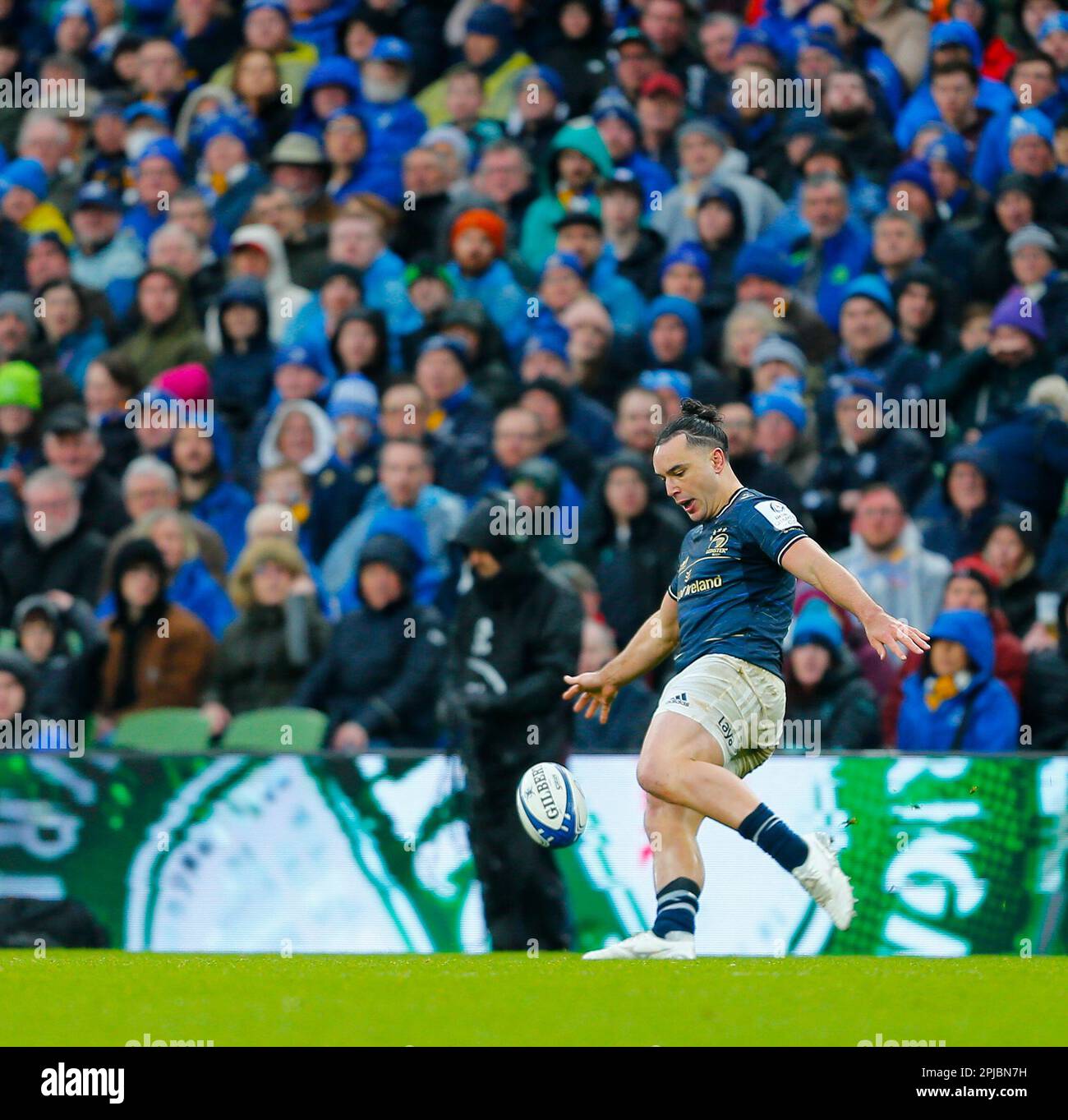 Aviva Stadium, Dublin, Ireland. 1st Apr, 2023. Heineken Champions Cup Rugby, Round of 16, Leinster versus Ulster: James Lowe of Leinster chips the ball forward Credit: Action Plus Sports/Alamy Live News Stock Photo