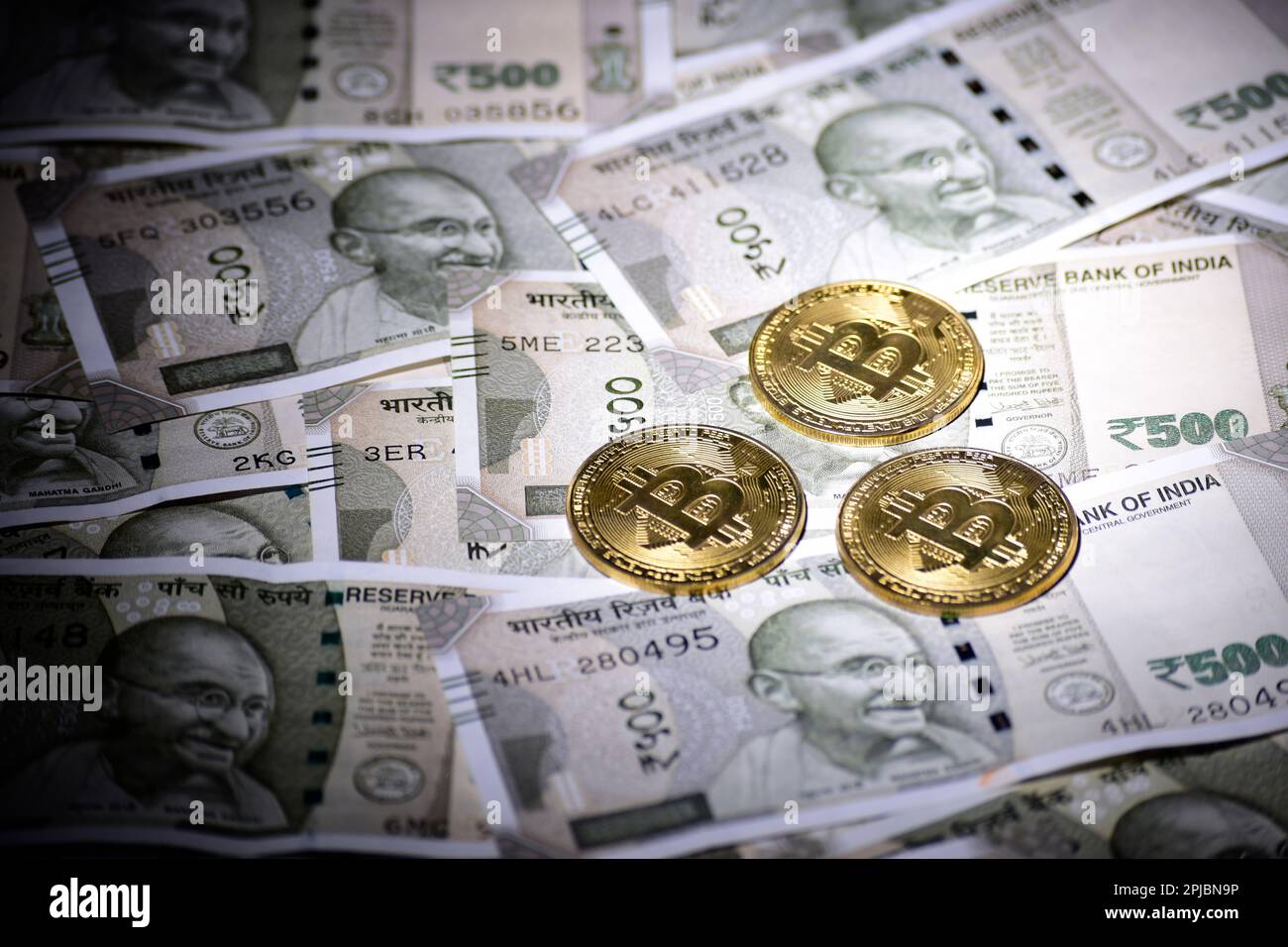 Bitcoin with indian currency bank note, cryptocurrency investment in india  concept Stock Photo - Alamy