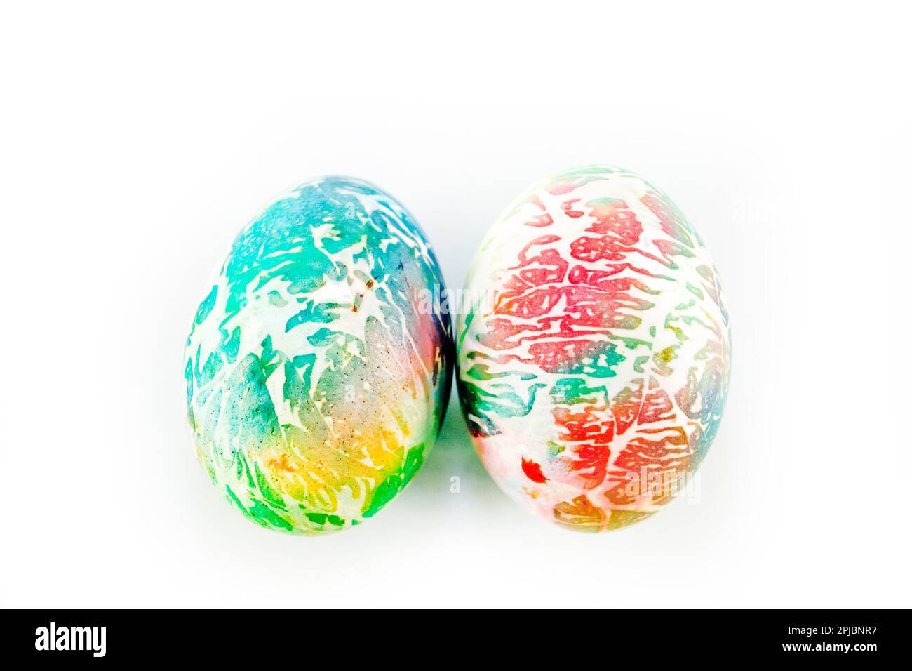 multicolored eggs on white background Stock Photo
