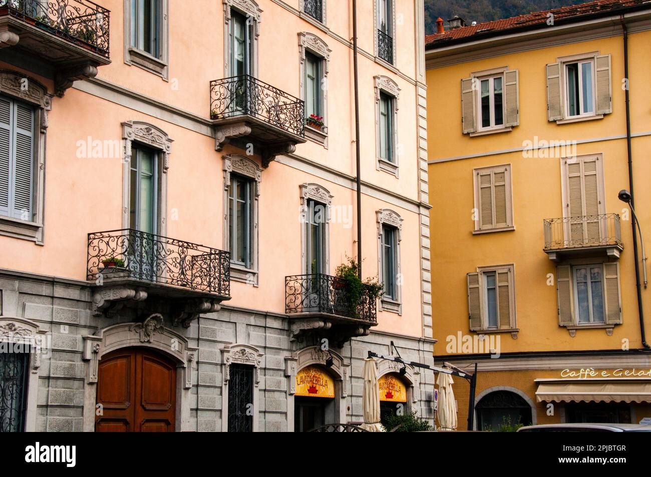 The Italian city of Como tucked between Lake Como, the third largest lake in Italy, and the Italian alps. Stock Photo