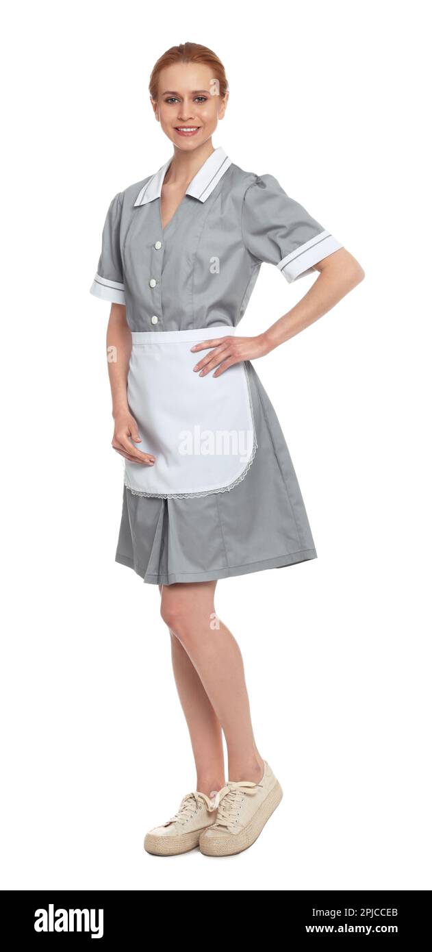 Full length portrait of chambermaid in tidy uniform on white background Stock Photo