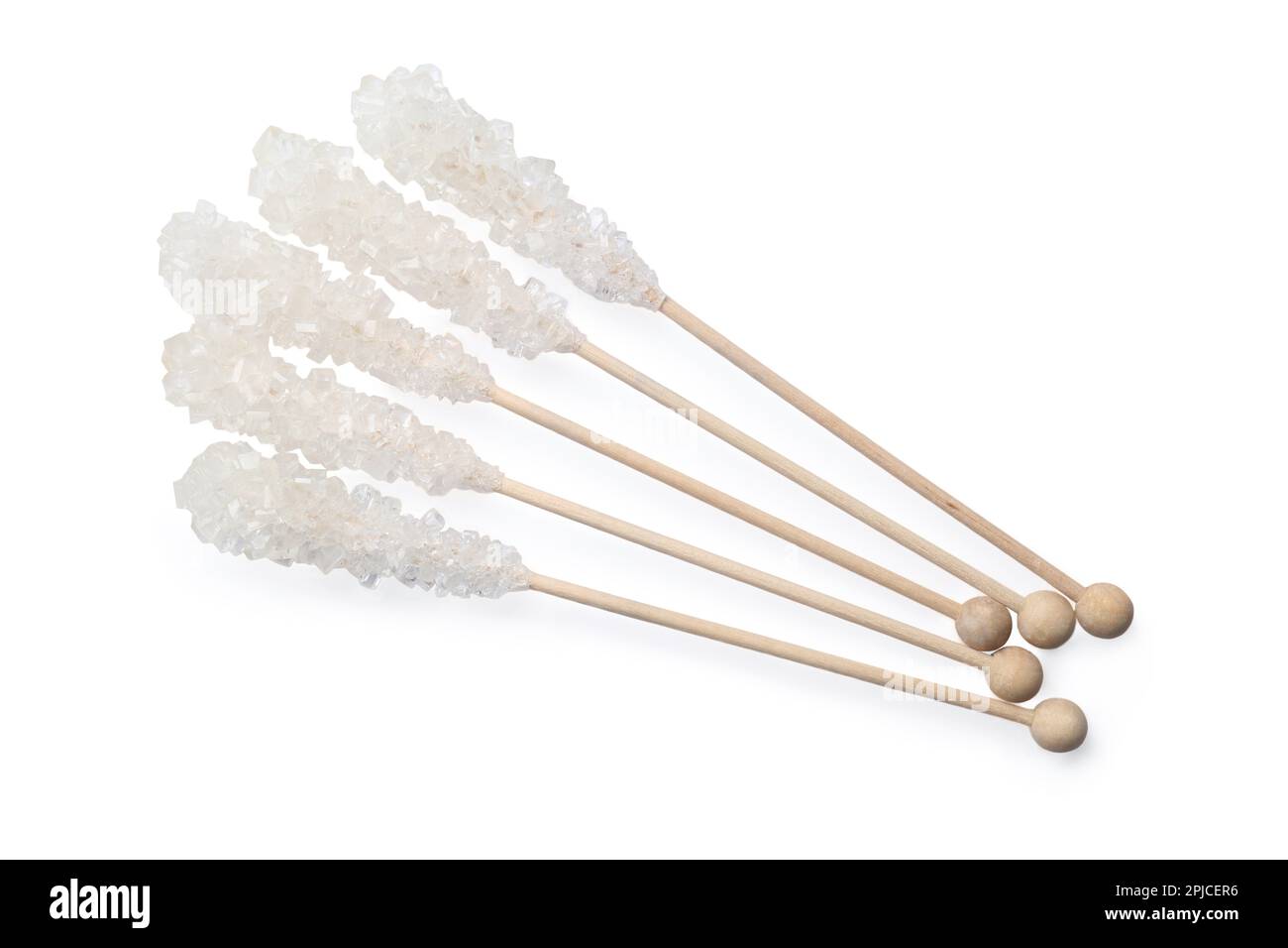 Tsaty Rocks Wooden sticks with sugar crystals isolated on white, top view. Tasty ...