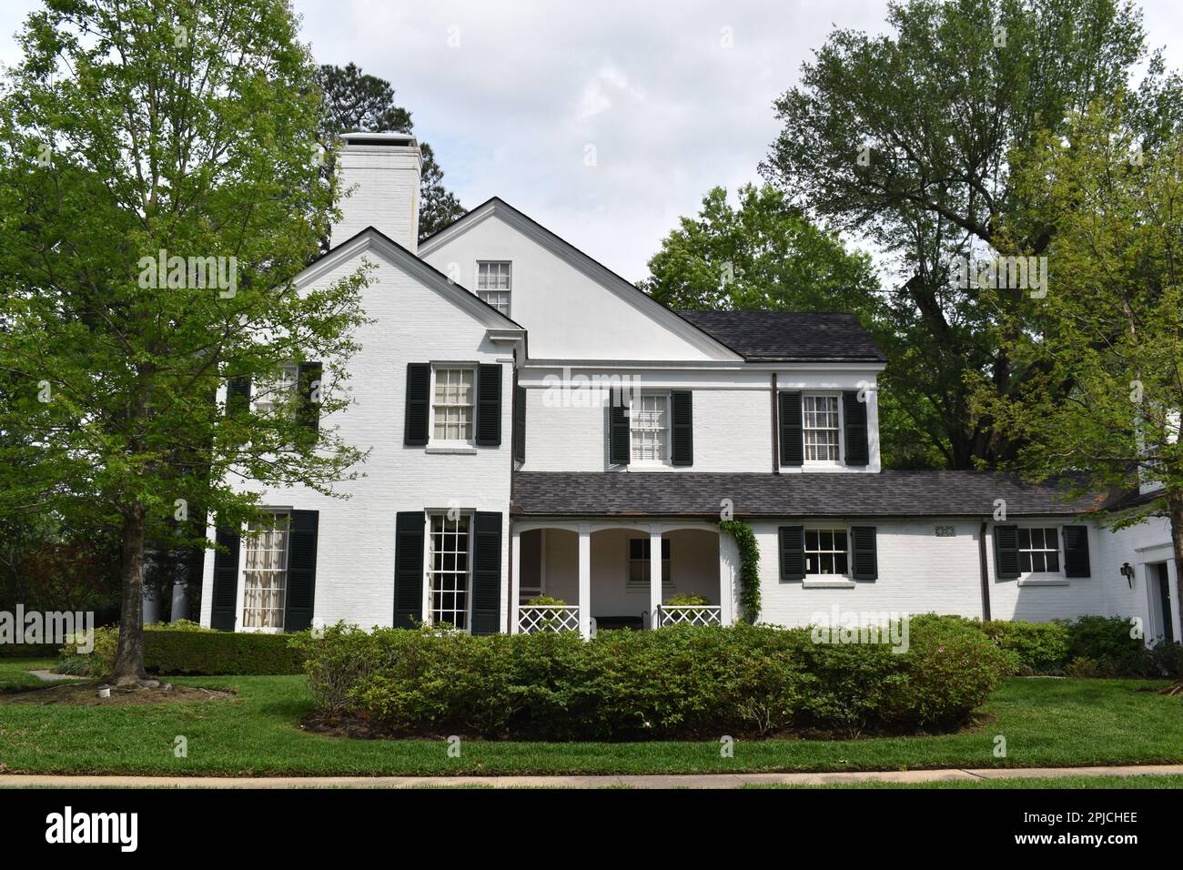 A portrait of a large traditional house in Houston, TX Stock Photo Alamy