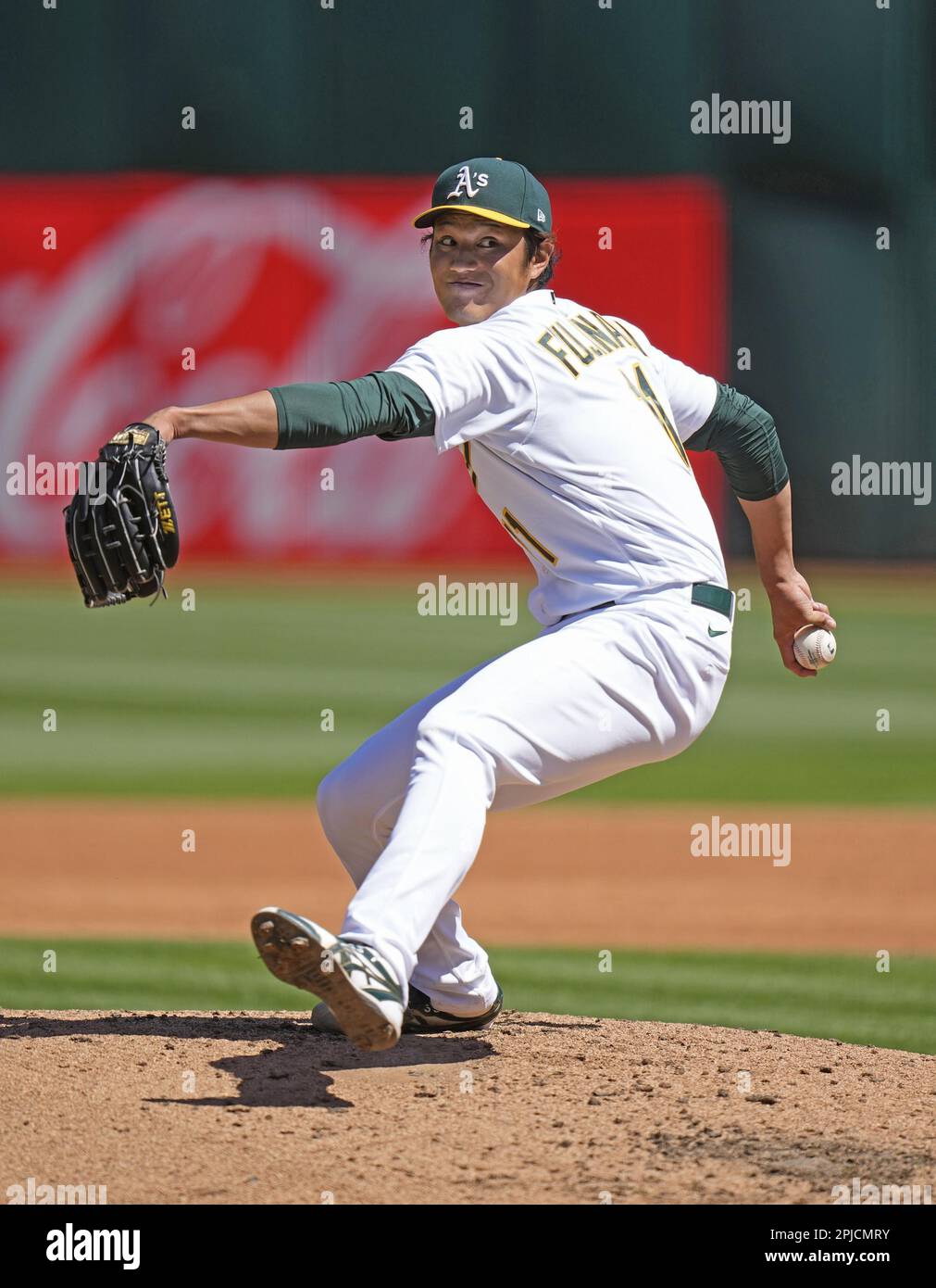Shintaro Fujinami of the Oakland Athletics pitches in a baseball game ...
