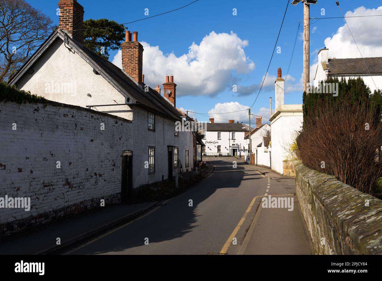Shawbury, UK March 7, 2023; View past traditional homes to local