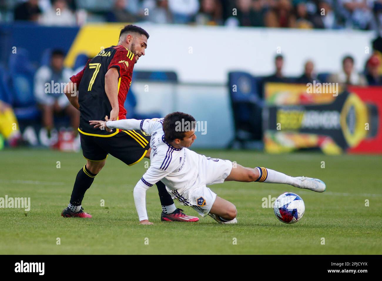 LA Galaxy Midfielder Riqui Puig (6) Reaches The Ball While Defended By ...