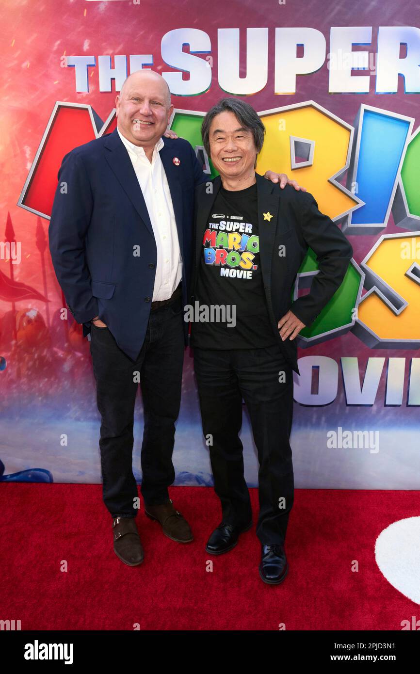 Chris Meledandri, left, and Shigeru Miyamoto arrive at the premiere of