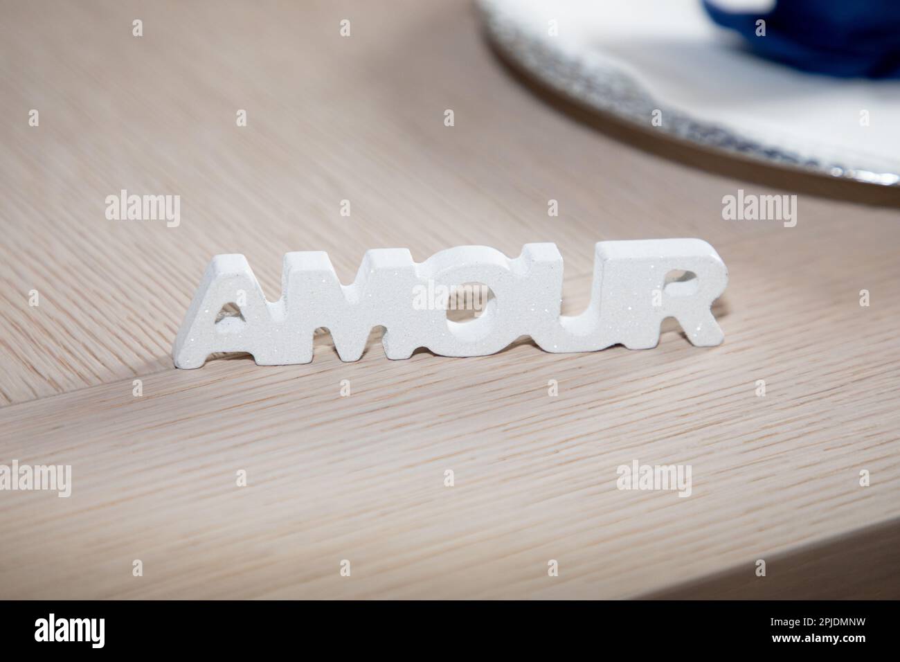 amour french text in wooden means word love on dining table restaurant ...