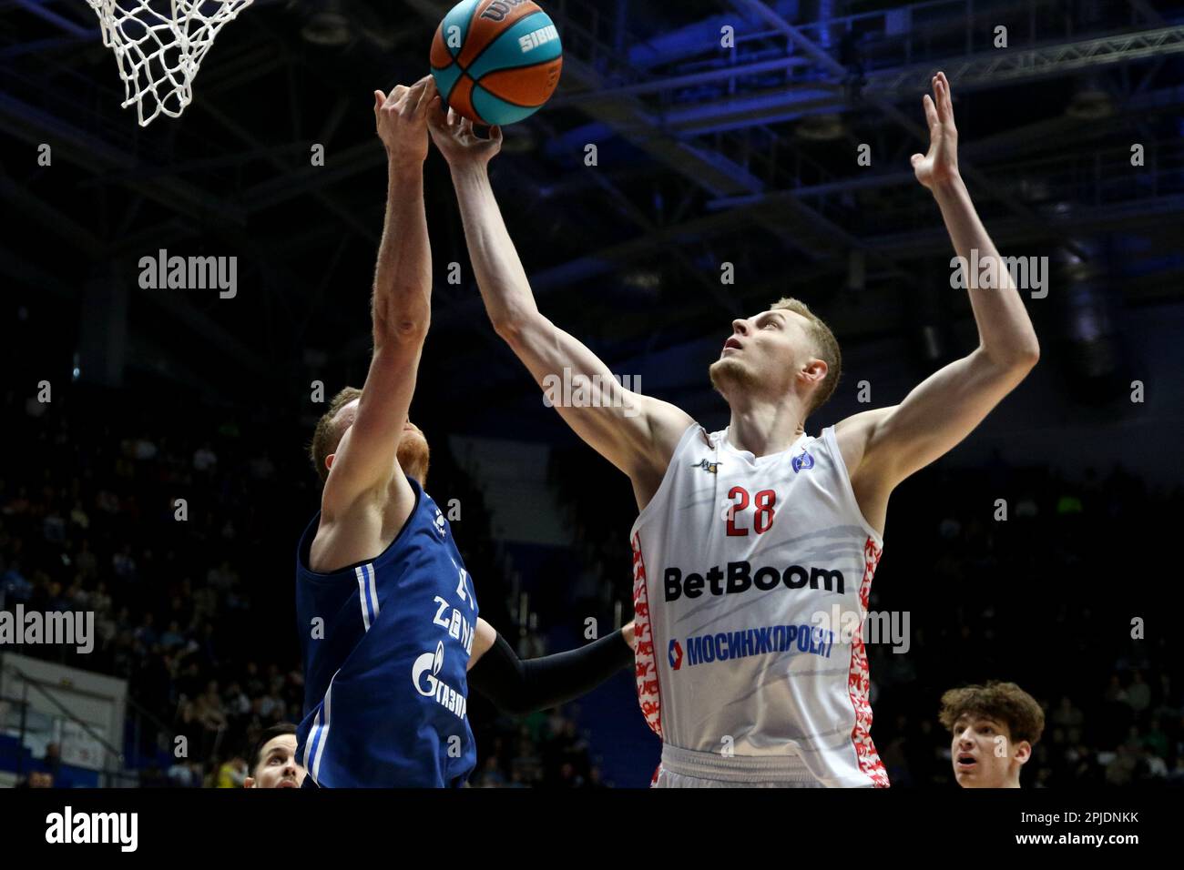 Saint Petersburg, Russia. 01st Apr, 2023. Sergey Toropov (No.21) of Zenit  St Petersburg and Andrey Lopatin (No.28) of MBA Moscow and in action during  the VTB United League basketball match, Second stage,