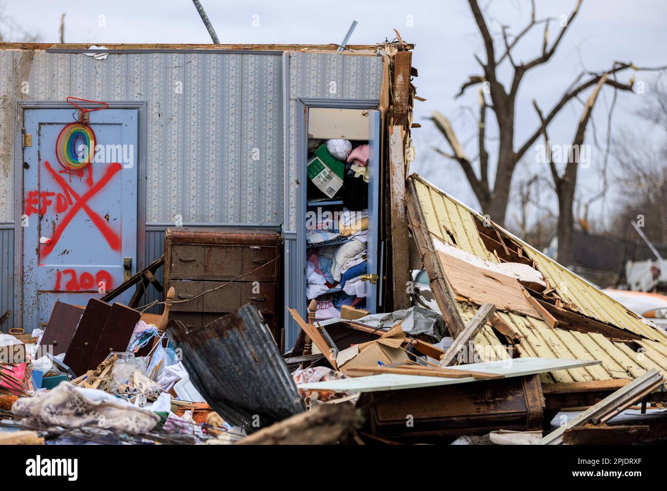 Sullivan, USA. 01st Apr, 2023. A home in a residential area is in ruins ...