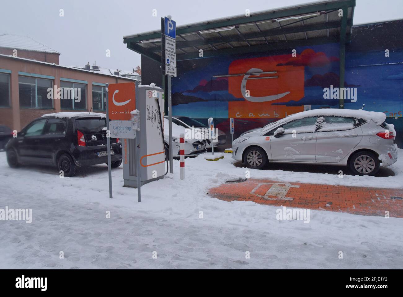 Electric cars on charge at a Cambio CarSharing station in Aachen