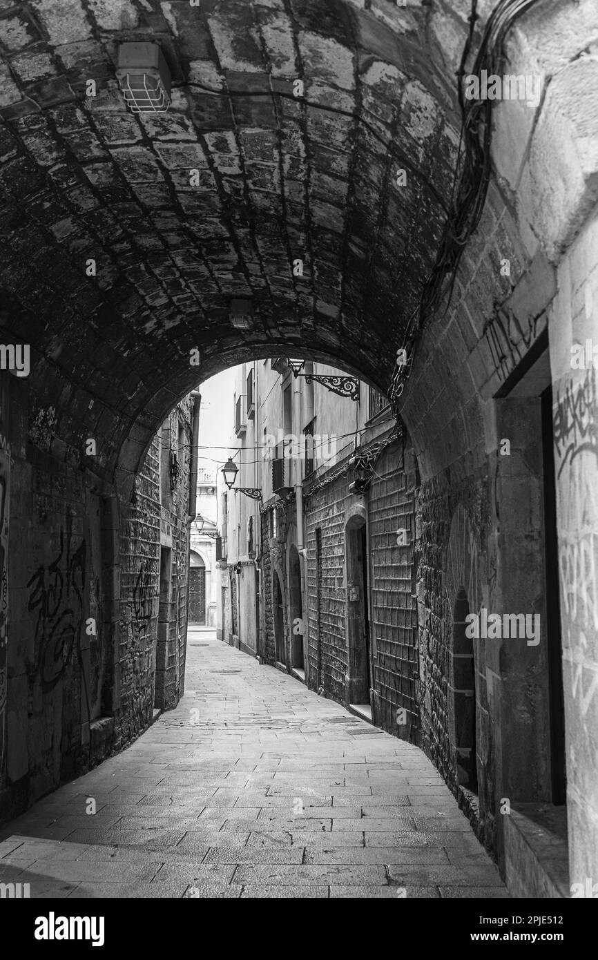 Pedestrian Tunnel on a Narrow City Street in the Gothic Neighborhood of