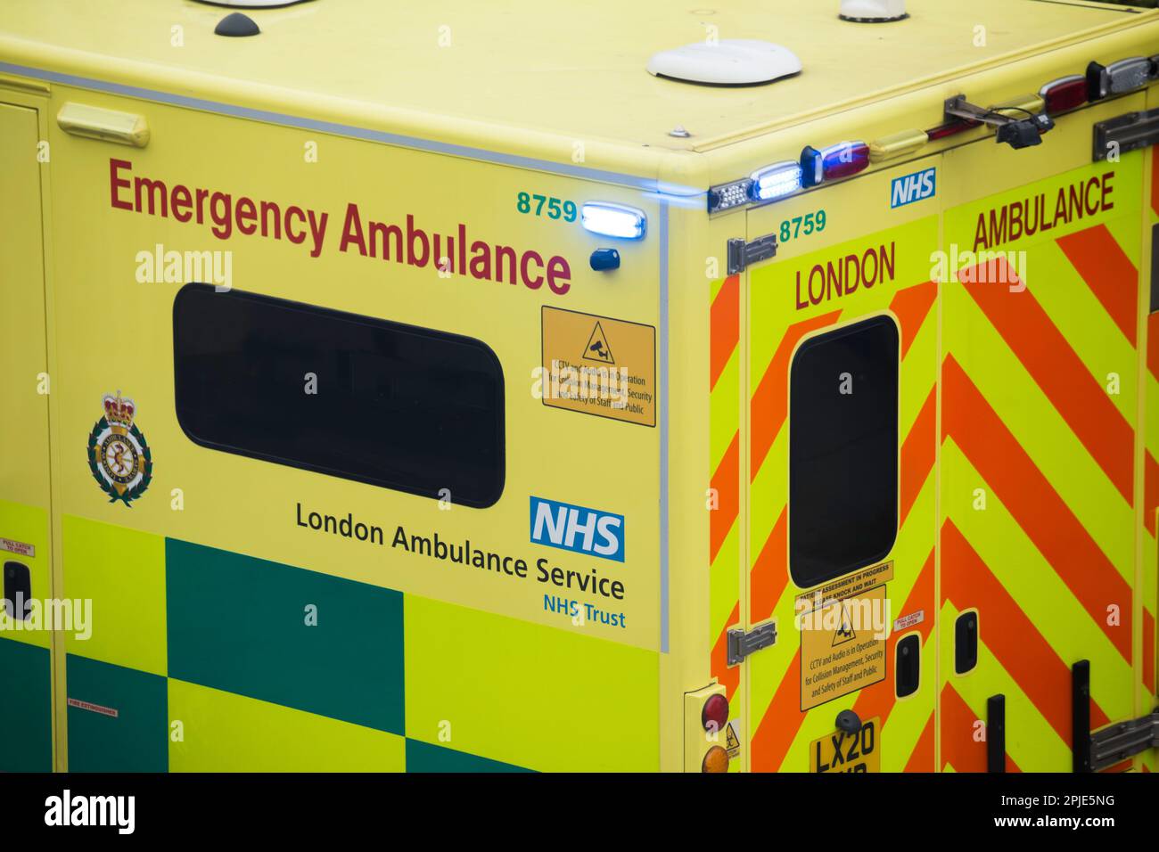 Close up of London Ambulance with blue emergency lights Stock Photo