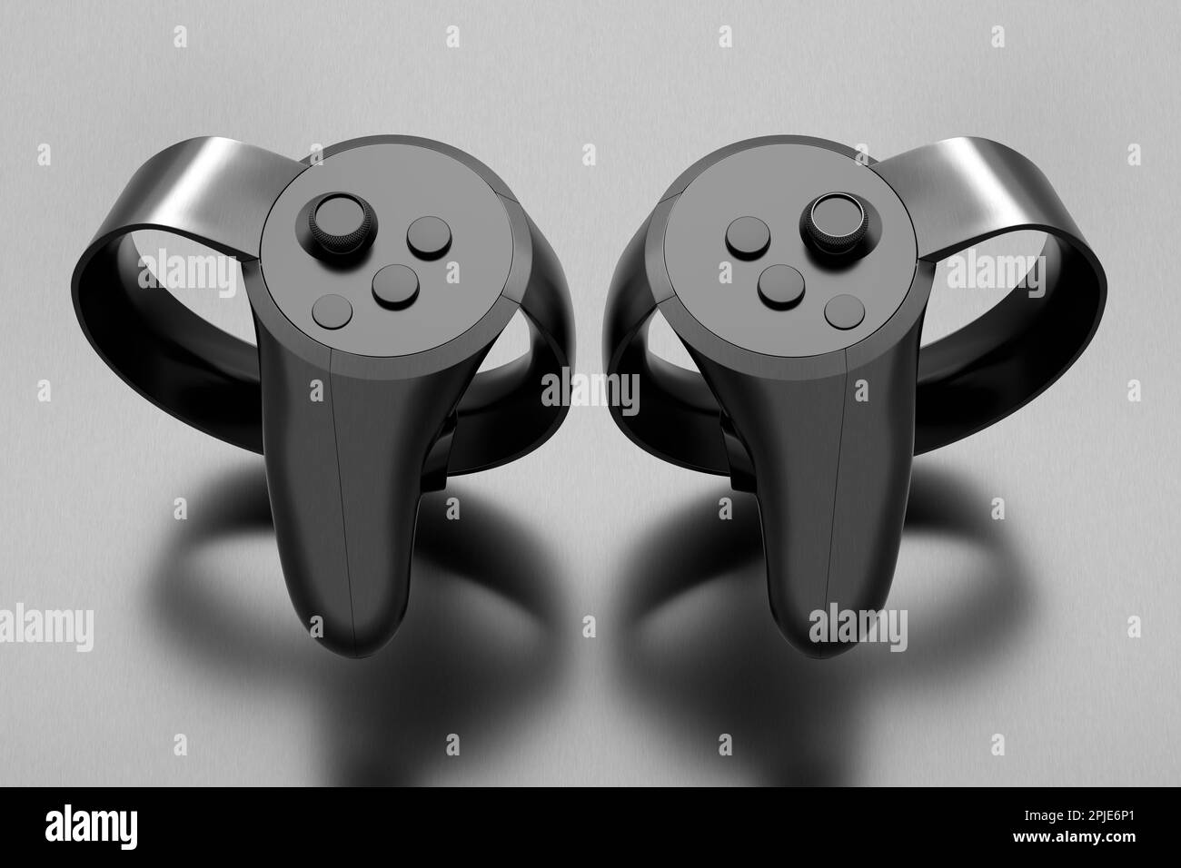 Virtual reality controllers for online gaming with metallic chrome texture on dark background. 3D render of streaming gear for cloud gaming and gamer Stock Photo